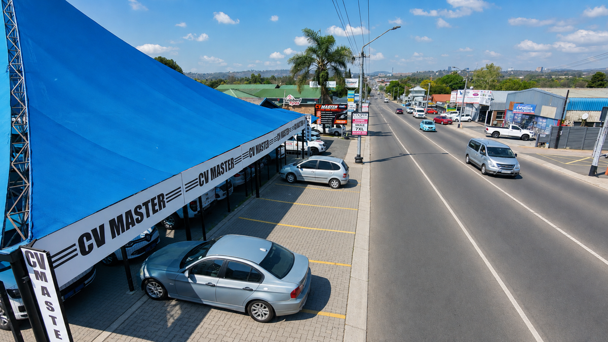 Aerial view of the CV Master forecourt and shaded customer parking on Steve Biko Road, the workshop for CV joint repair in Pretoria